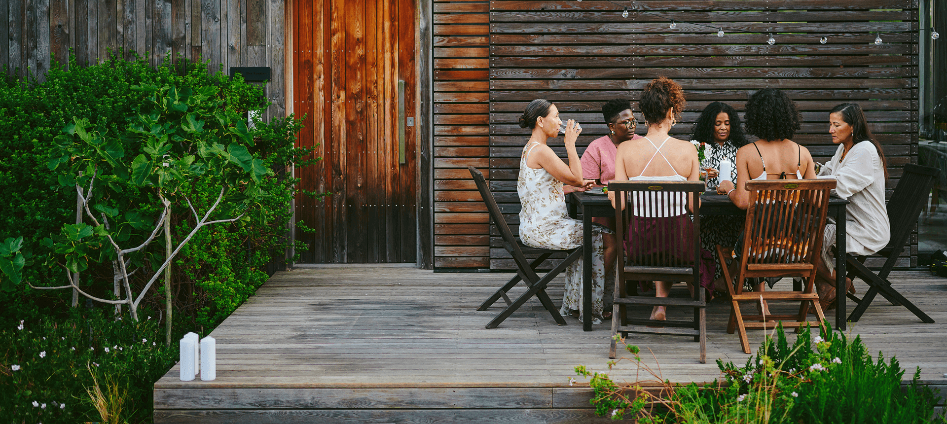 Friends gathered at outdoor table